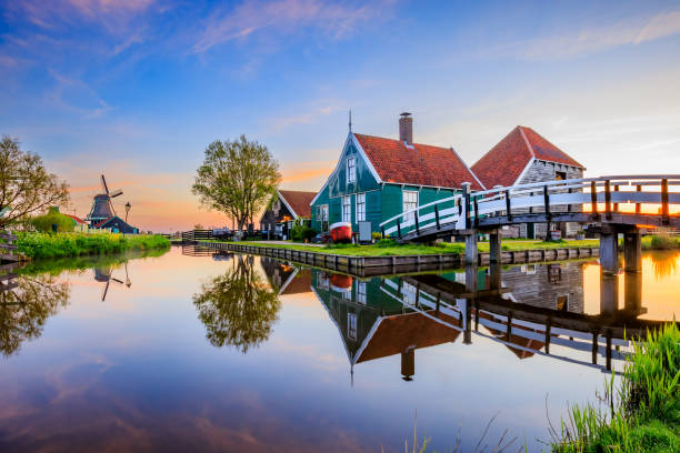 Cyclist near the windmills at Zaanse Schans